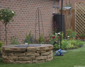 firepit, artificial grass, rose, drystone wall, plews garden design, plews garden landscaping, garden sundries