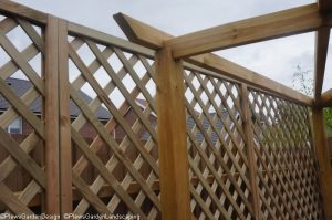 diamond trellis fence, wooden pergola, garden project, garden designer, landscape gardener