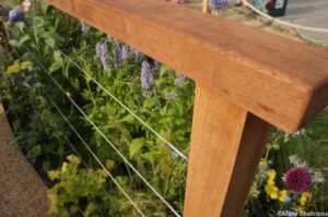 limbcare garden, hampton court 2018, planed wood and wire fence