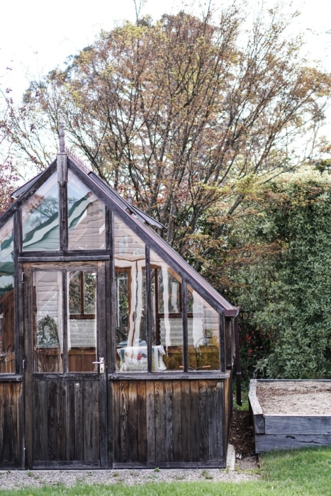 wooden greenhouse, raised beds Photo by Anna Guerrero from Pexels;
