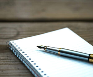 notebook and fountain pen